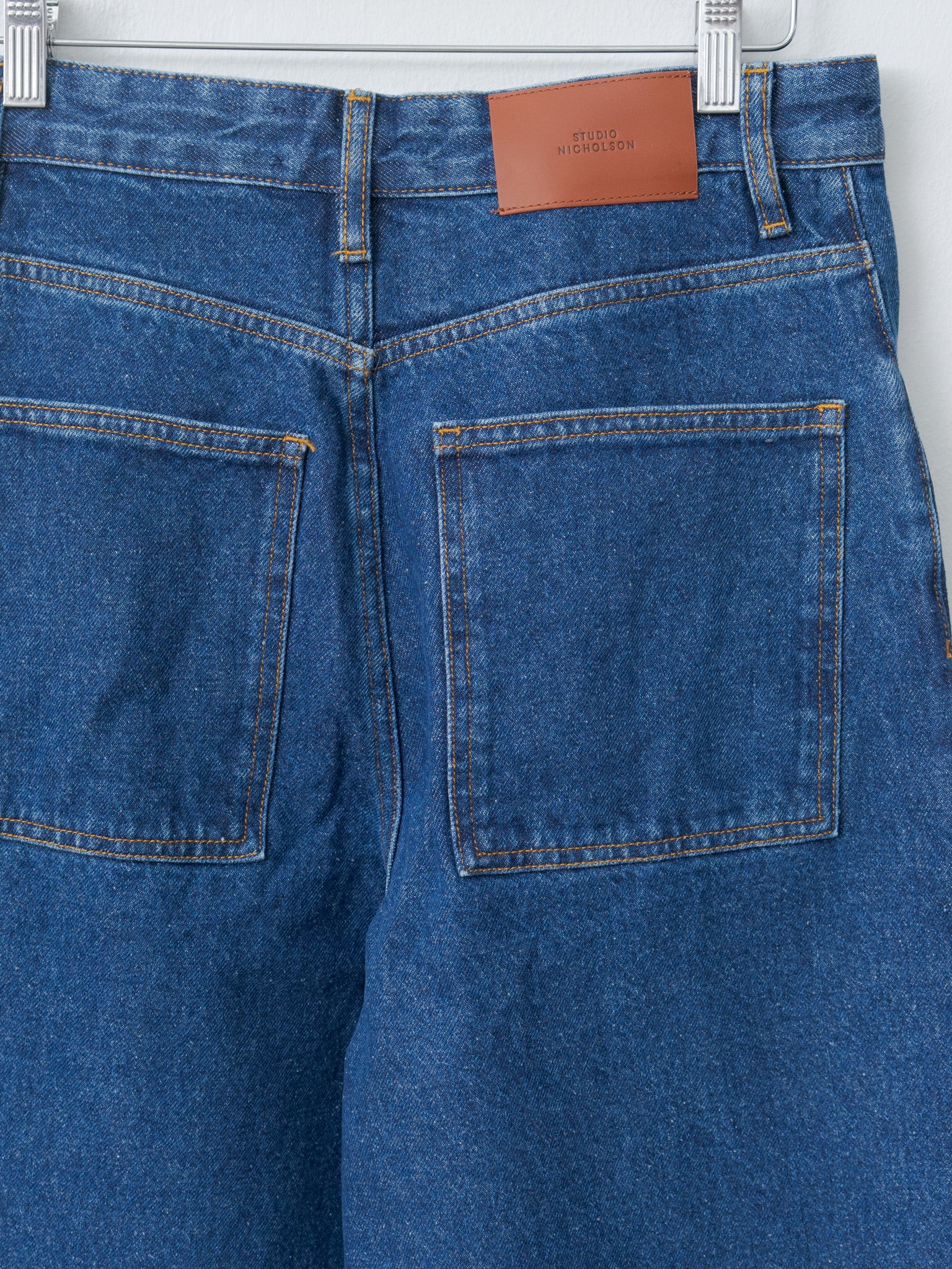 Namu Shop - Studio Nicholson Neive Curved Leg Pant - Indigo Wash